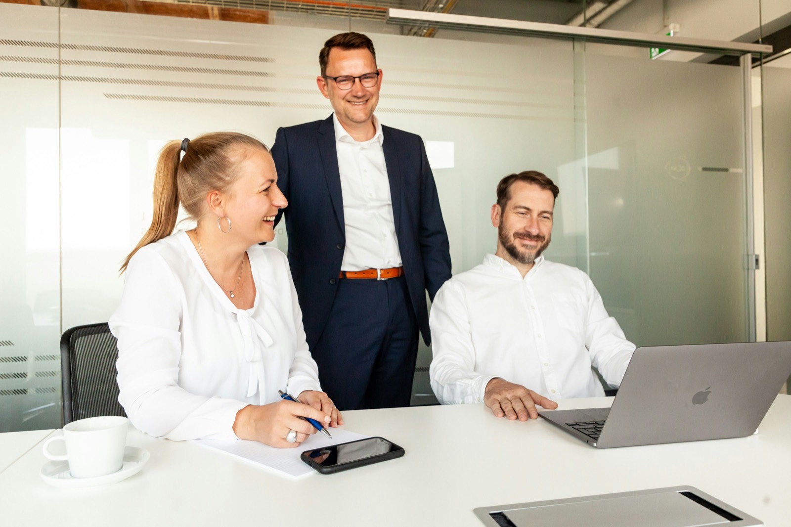 A professional services team meeting in an office